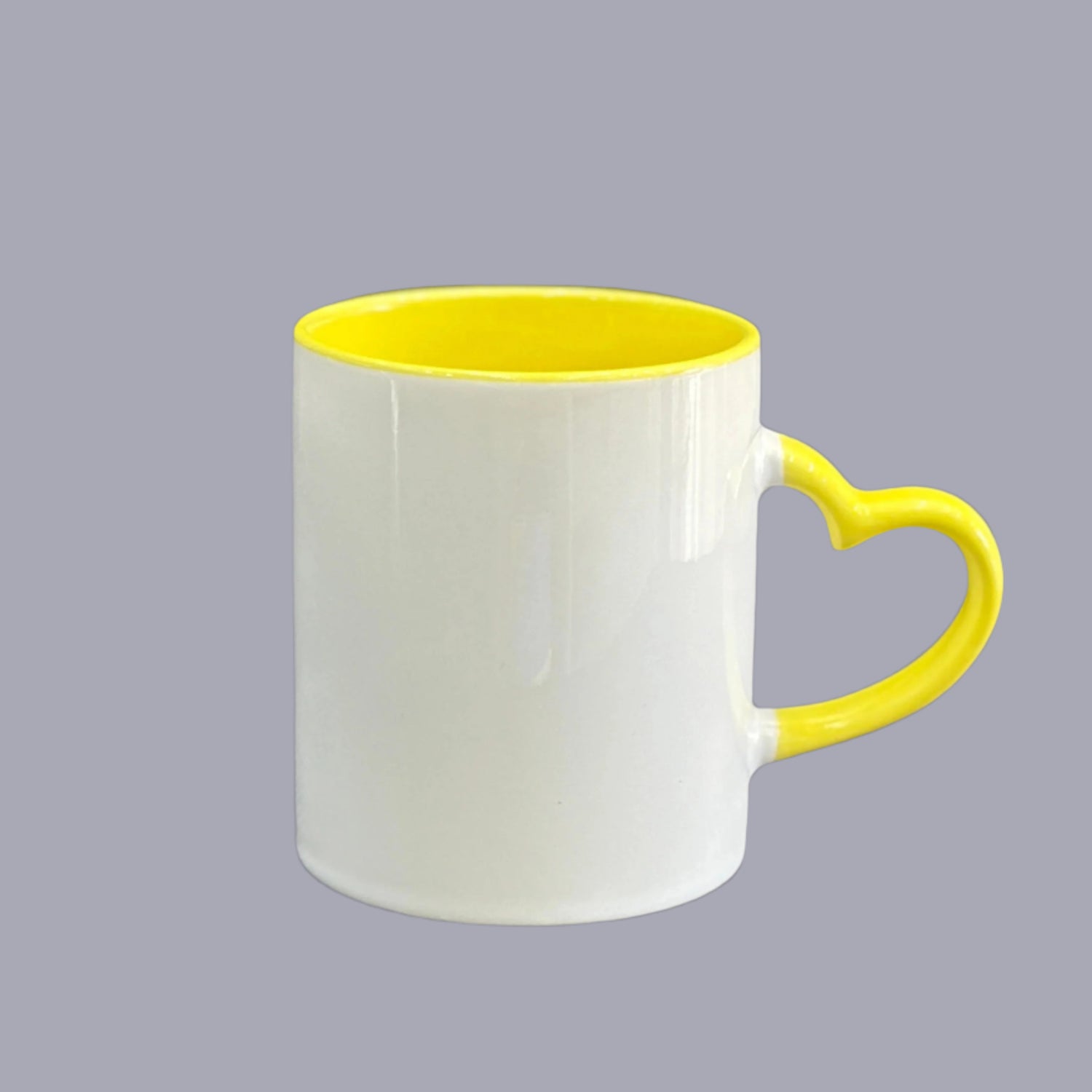 White Mug with Heart-Shaped Handle and Yellow Inside – Custom Printing | Raifa Print Qatar